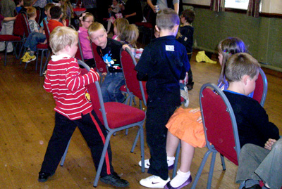 Children playing Musical Chairs